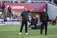 Barcelona boss Hansi Flick (left)